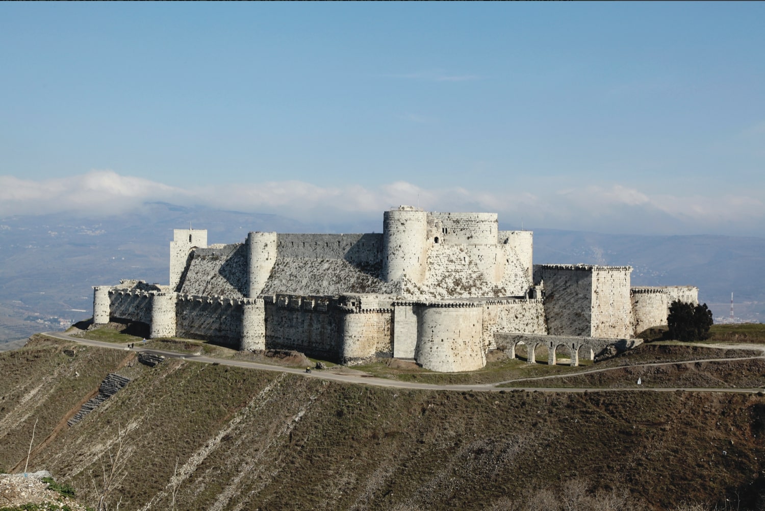 Krak des Chevaliers, a Crusader castle and UNESCO World Heritage Site, that has now been damaged during the war