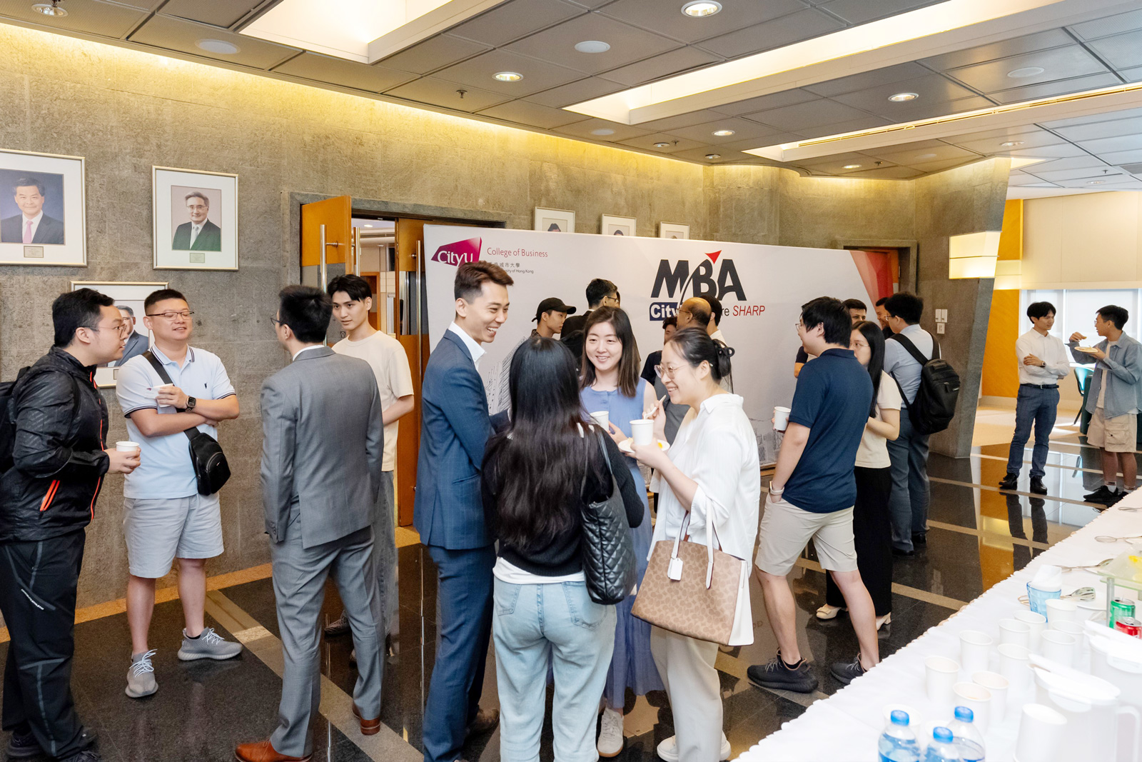 The attendees enjoy the networking session over refreshments