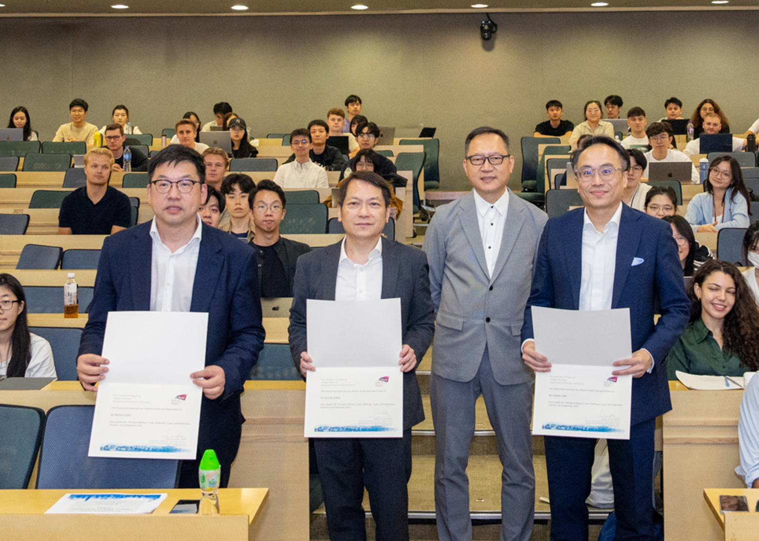 Professor Michael Wong (second from right) thanks the speakers for their insightful sharing.