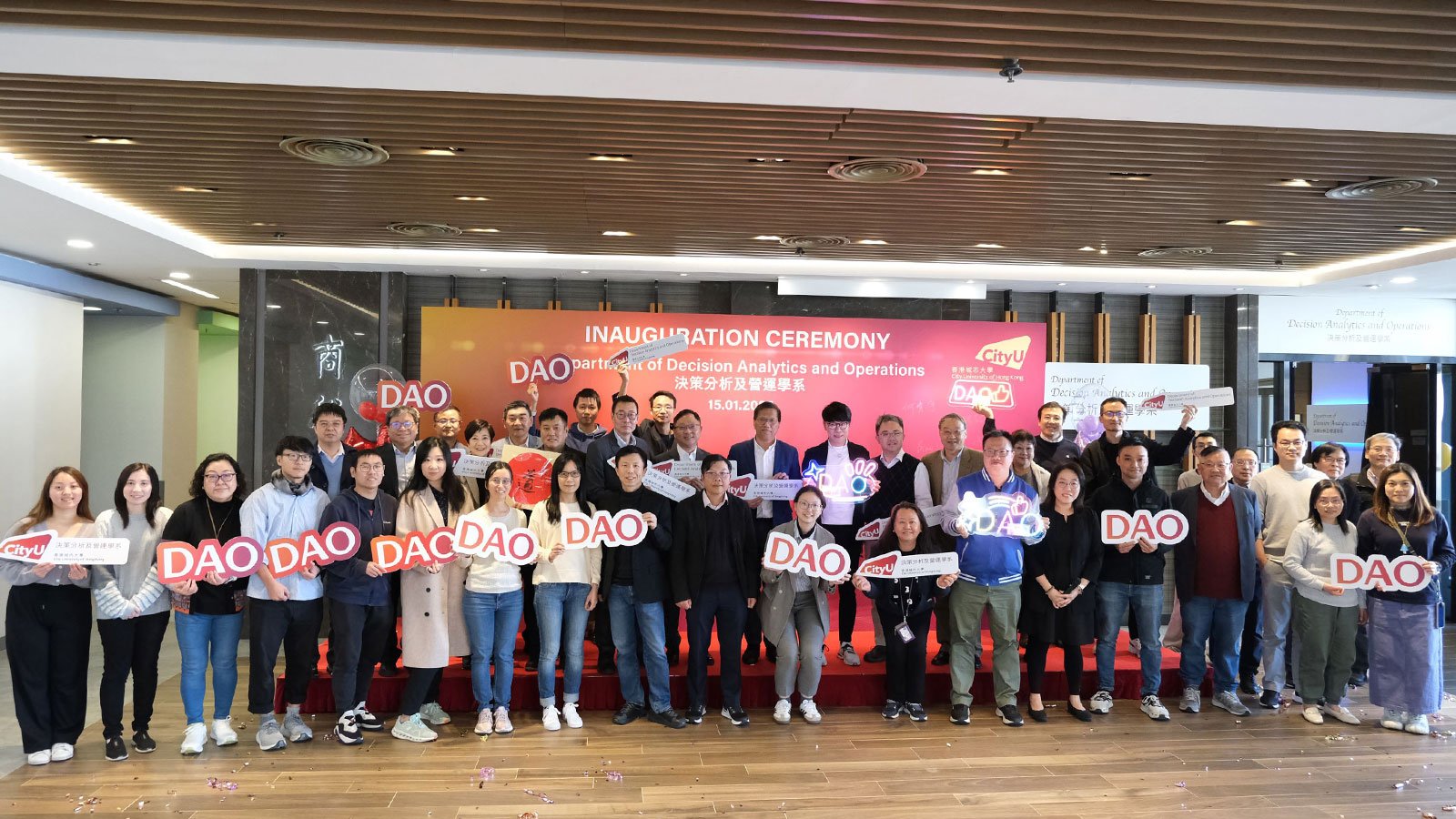 Faculty and staff from CB and DAO gather to celebrate the inauguration of the Department of Decision Analytics and Operations.