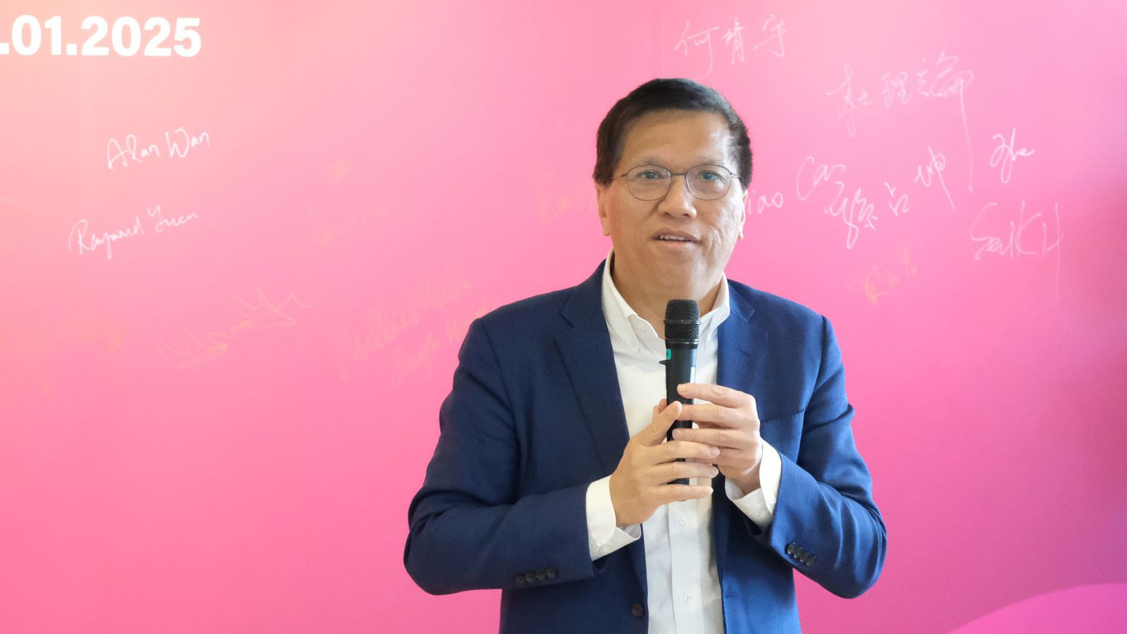 Professor Kalok Chan (Dean of College of Business) celebrates the DAO