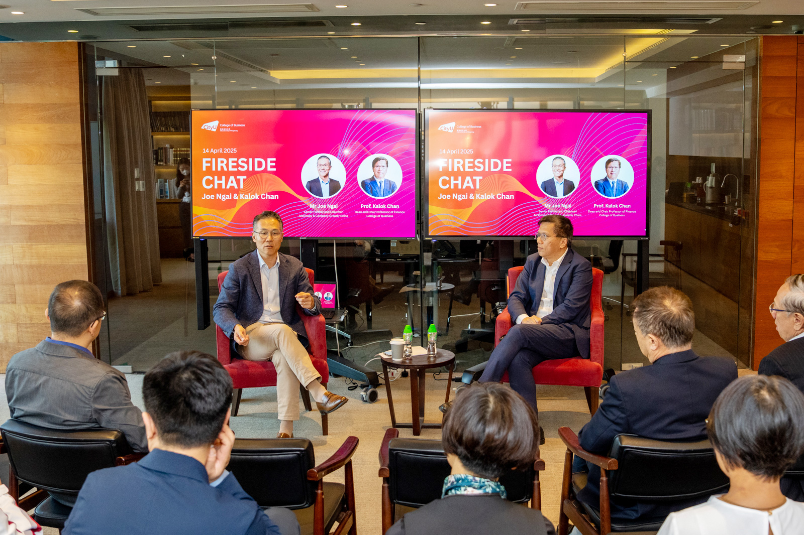 The College of Business hosts a fireside chat featuring Joe (left) and Dean Kalok Chan (right).
