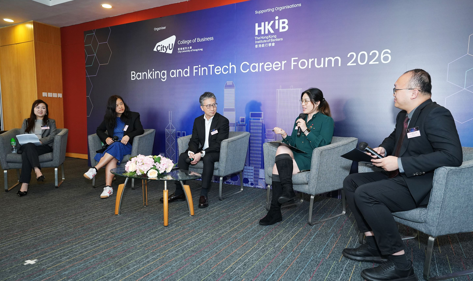 (From left) Speakers Dr Kate Kwan, Senior Manager, Professional Assessment & Strategic Partnership, The Hong Kong Institute of Bankers; Ms Debbie Man, Head of Compliance from a Top Japanese Bank in Hong Kong; Mr Theodore Mak, Managing Director, Head of Retail Distribution, Hang Seng Bank Limited; Ms Serena Mak, Executive Director, Sustainable Finance, Institutional Banking Group, DBS Bank (Hong Kong); and Moderator Prof. Alvin Leung, CB Associate Dean ( Undergraduate Programmes) share their insight of the development of the banking industry.