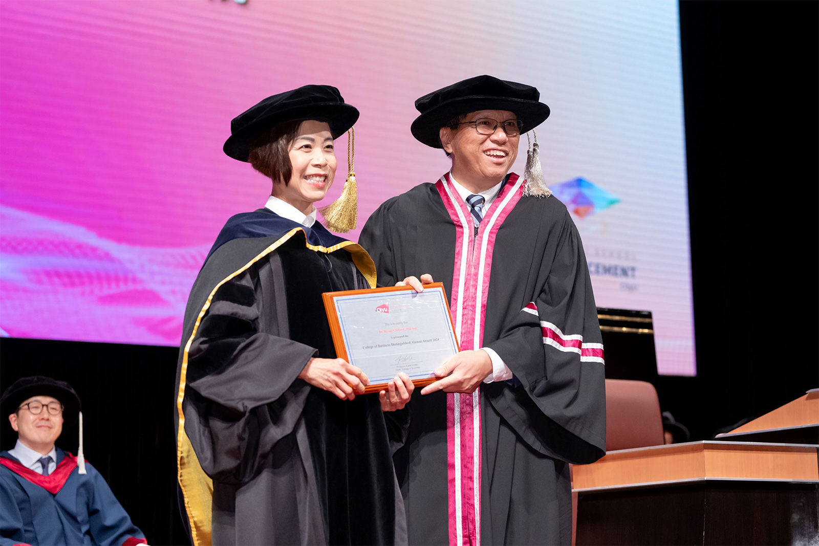 The recipient of 2024 College of Business Distinguished Alumni Award: Dr Bessie Chong Pui-san (left)