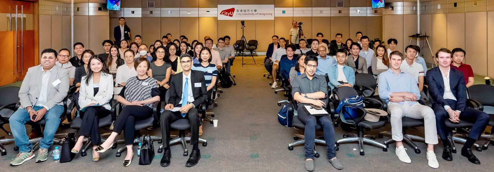 Group photo of the speakers (from left in the first row): Mr Syed Musheer Ahmed, Ms Teresa Lin and Ms Angel Ng; Moderator Professor Rajeev Chib; and participants