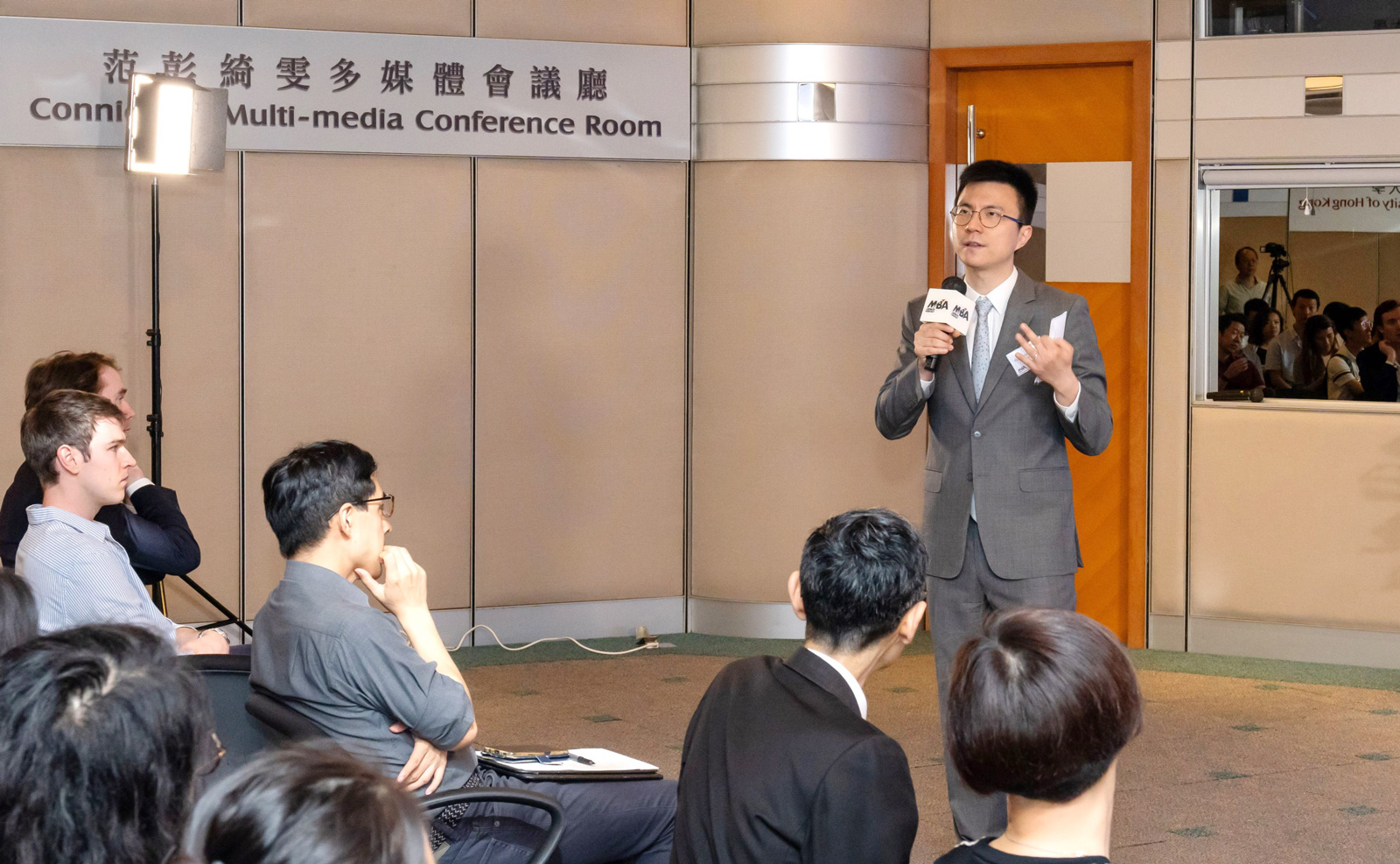 MBA Associate Director Professor Chak-fu Lam delivers a welcome remark before the Symposium began