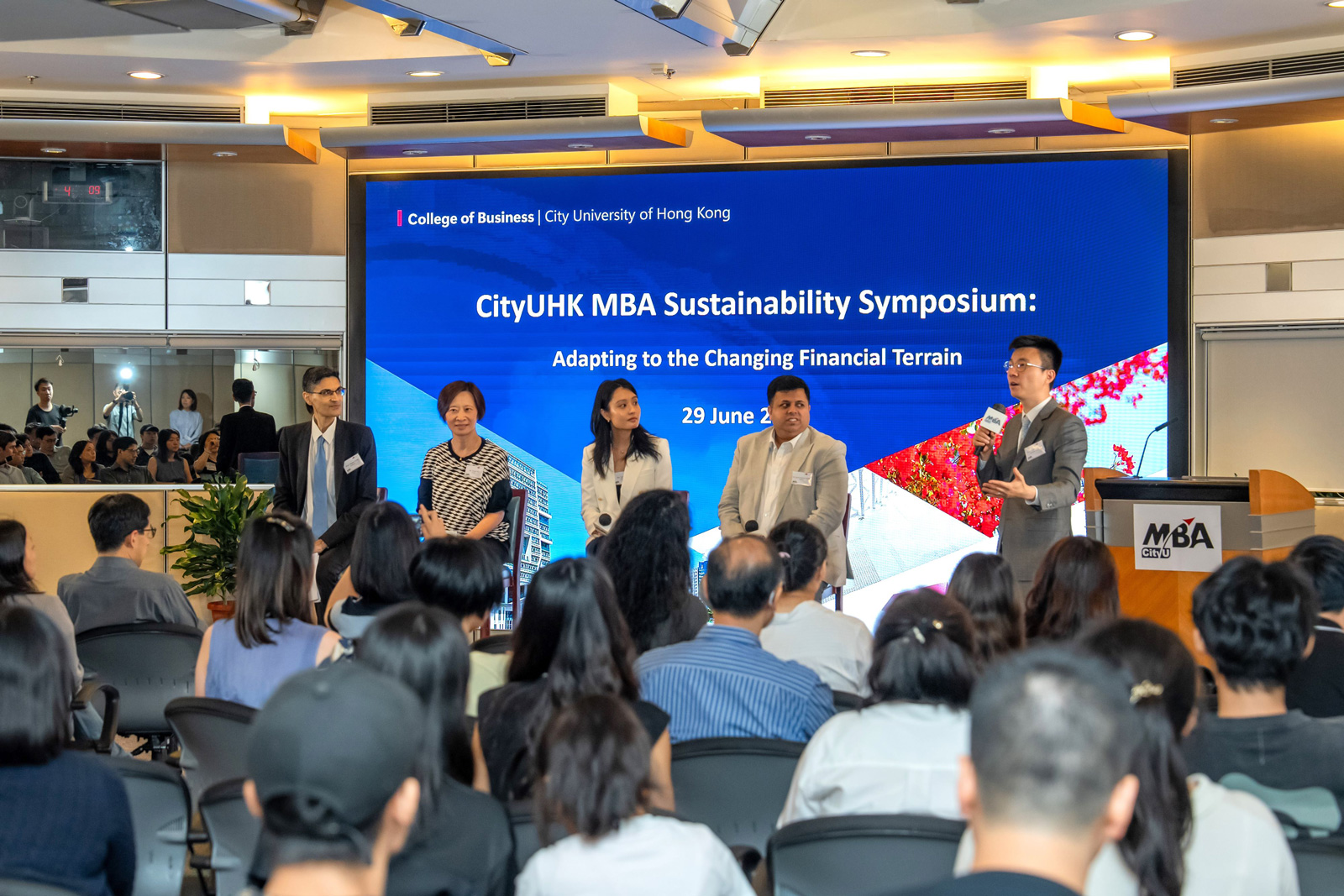 The audiences exchange views with the speakers and moderator during the Q&A discussion