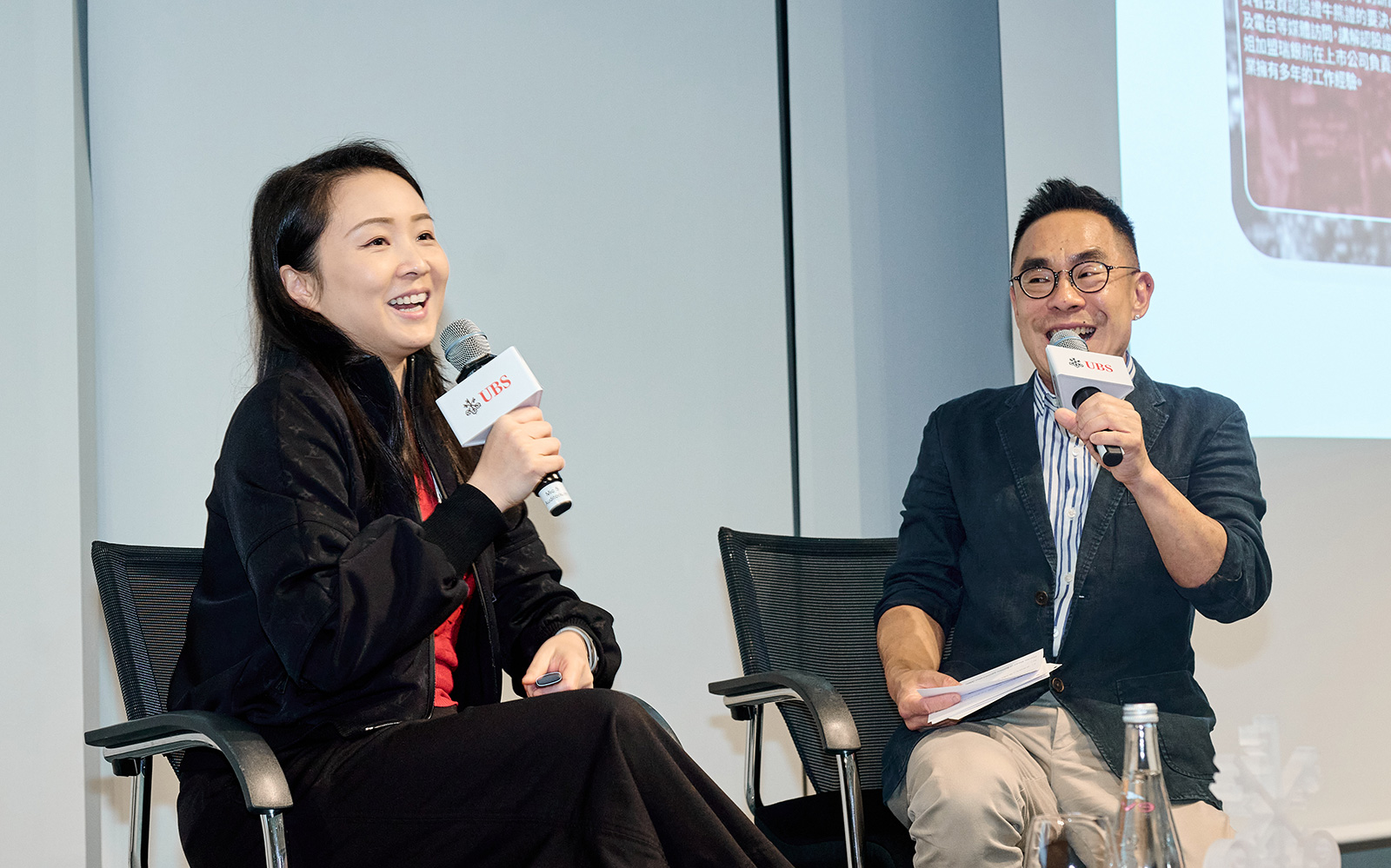 (From right) Mr William Lam serves as the interpreter for Ms Winni Cheuk