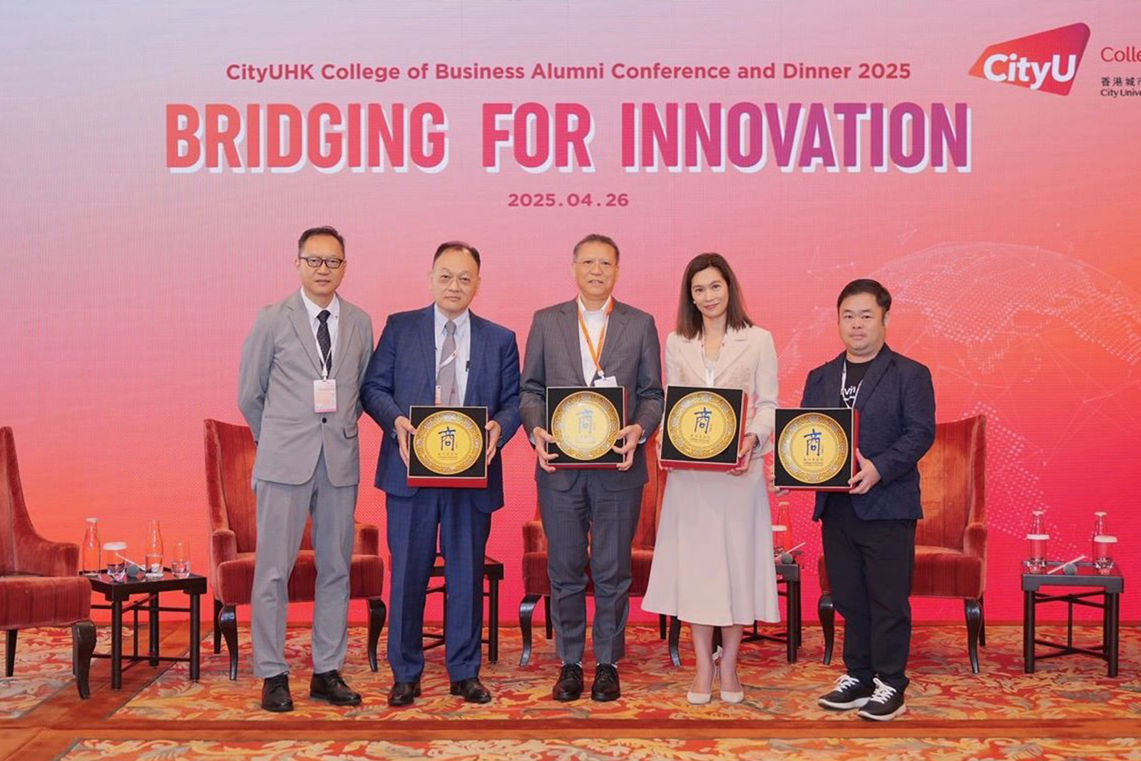 (From left) Professor Michael Wong, moderator of panel one, presents souvenirs to the panelists Dr. Benny Luk, Mr. Peter Ko, Ms. Jesse Yau and Mr. Calvin Wu.