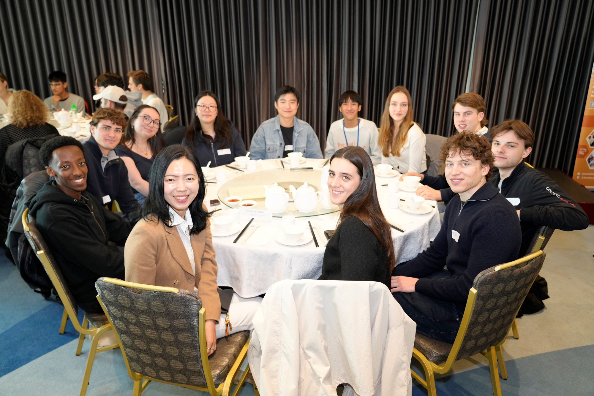 Incoming exchange students gather for a welcoming luncheon to engage with CityUHK professors and staff, fostering a sense of belonging.