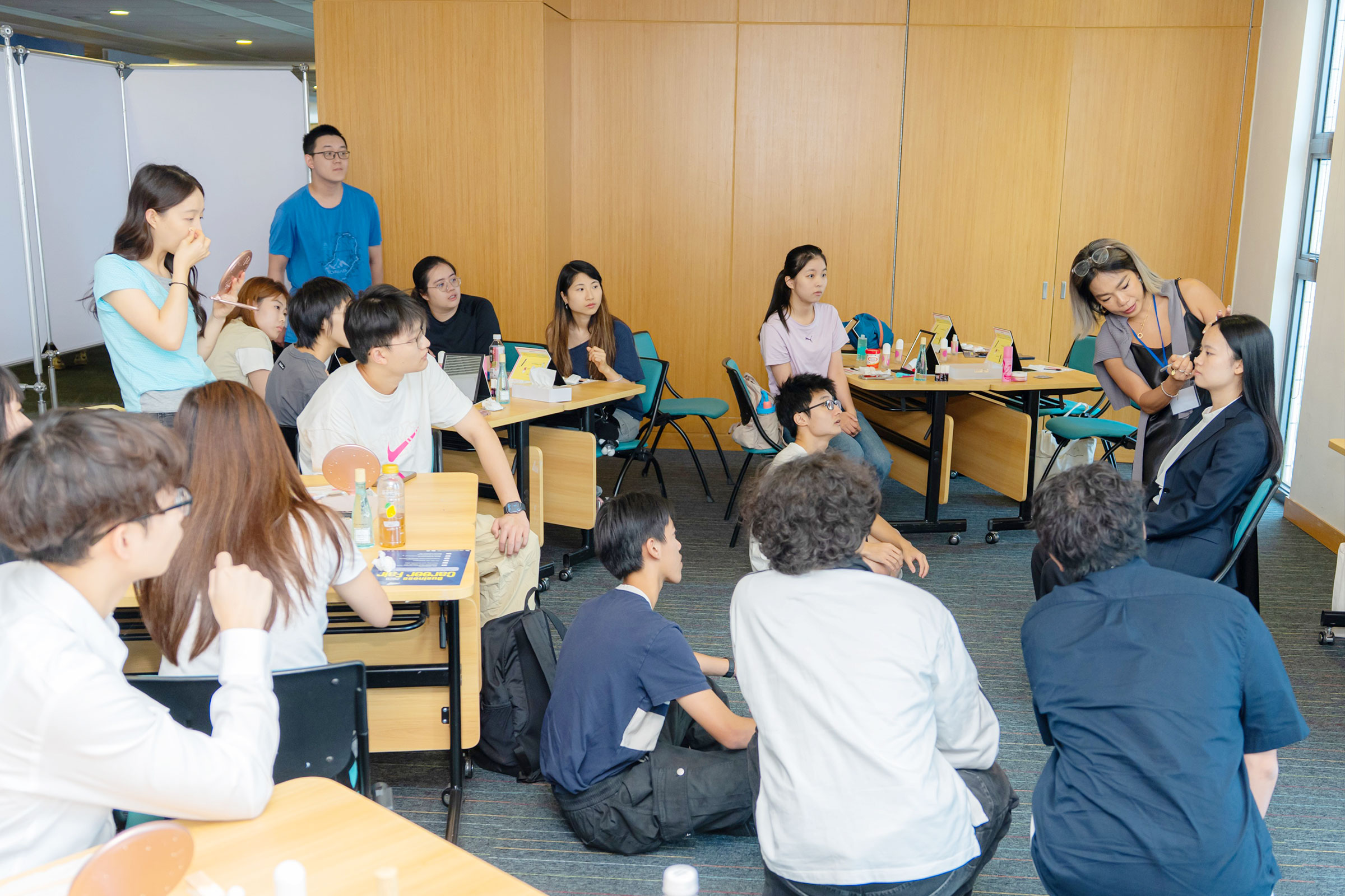 Students join the “Business Grooming” workshop, learning how to make a lasting first impression.