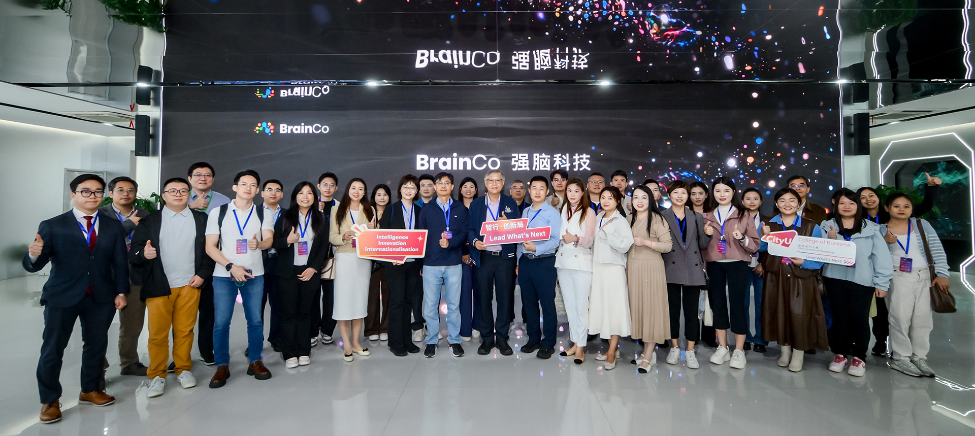 Alumni step inside the BrainCo office, one of Hangzhou's renowned 'Six Little Dragons' and a global pioneer in brain-computer interface (BCI) technology.