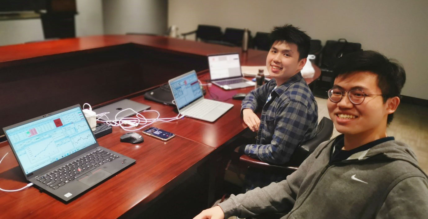 Raymond Widjaja (left) and Yongzheng Zhi (right) during the trading break.