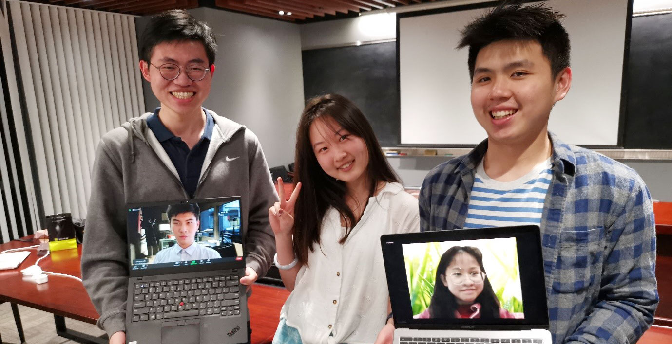 EF team members: Yongzheng Zhi (left), Shanzhen Ba (boy on the screen), Raymond Widjaja (right), Meijia Chen (girl on the screen), and the former team member, Xichen Liu (middle).