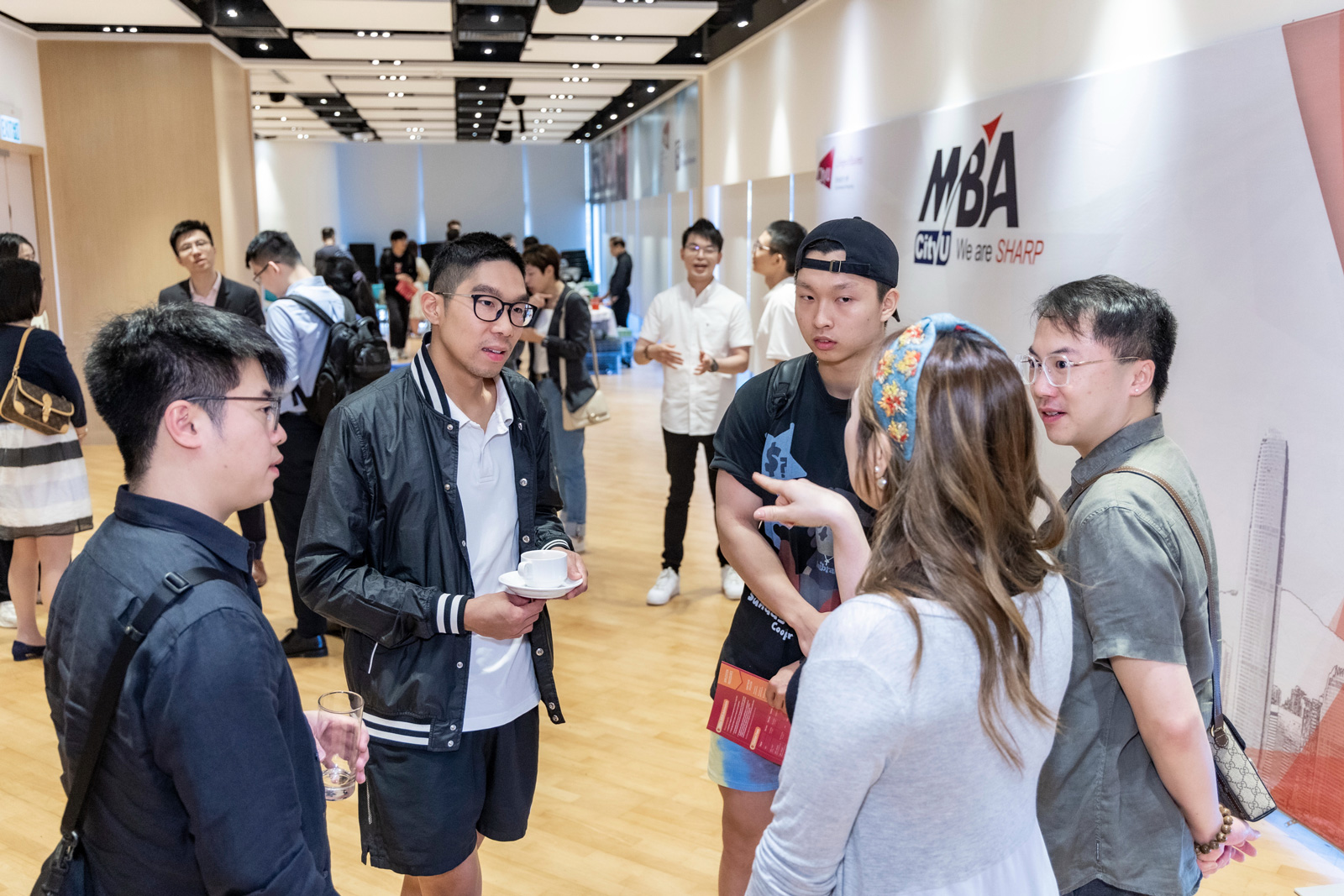 Participants communicate enthusiastically after the Masterclass