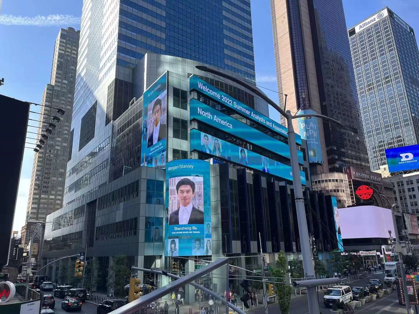 Shanzheng’s photo is shown at Morgan Stanley Headquarters in Times Square 